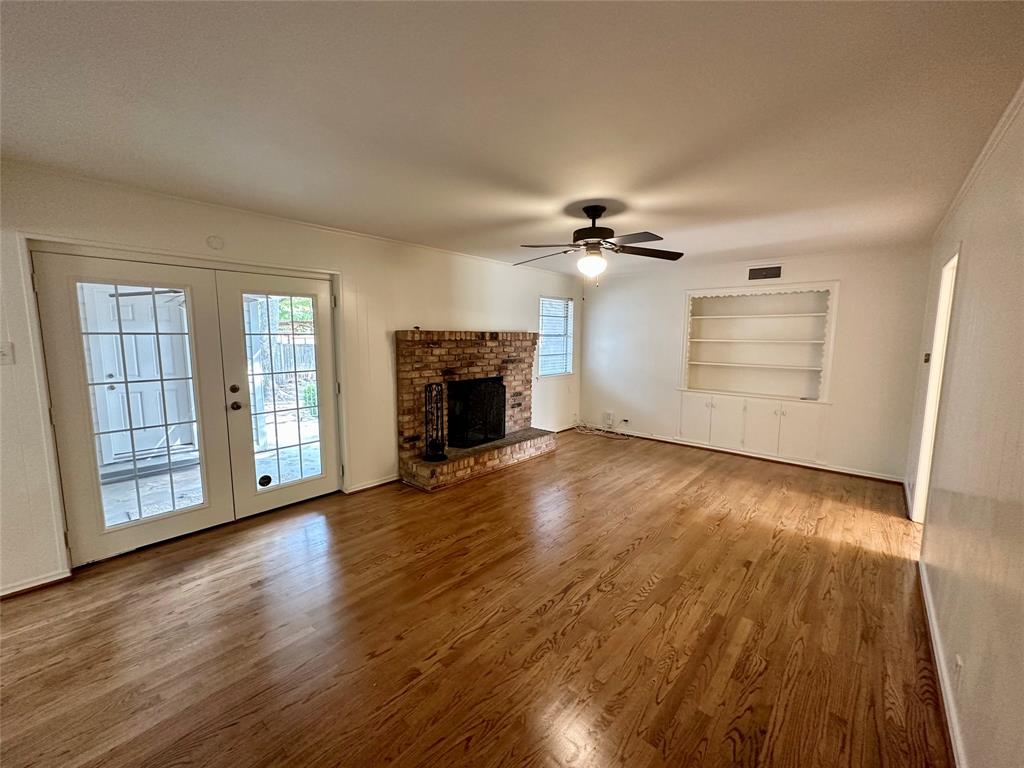 Charming 3 bedroom 2 bathroom home for rent in Heights! Walking distance to Arapaho elementary, West Jr High, and Richardson High. The home features a fresh neutral paint color scheme with light wood floors and brand new luxury vinyl plank flooring. No carpet! The family room has a nice brick fireplace, and the dining room is big enough for both a dining area and a sitting area or play area if desired. The home has 3 bedrooms and a large second living room that could be a fourth bedroom. The primary bedroom has a very cute separate built in vanity area and a nice sized walk in closet. The back yard has a couple of large mature trees that provide shade to a spacious concrete patio that would be great for grilling out! Pets are ok and are considered on a case by case basis.