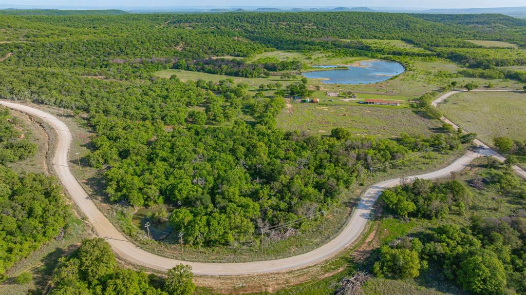 Discover Wide-Open Space, Natural Beauty, & Small-Town Charm With This 8+ Acre Property In The Sought-After Legends Of Comanche Moon Community, Located In Gordon ISD—Home Of A State Championship Football Program. This Scenic Property Offers Abundant Wildlife, Peaceful Surroundings, & The Perfect Setting To Build Your Dream Home, Weekend Retreat, Airbnb, Short-term Rental, Or Private Ranch. Rural Living Creates Memories You Just Can’t Replicate In The City. Anyone Who Wants To Get Out Of The City, Enjoy Nature, And Create A Lasting Legacy For Their Family. Enjoy The Tranquility Of Rural Living With Convenient Access To Outdoor Recreation, Just A Short Drive From Palo Pinto State Park, Where You Can Hike, Fish, Kayak, And Explore. Legends Of Comanche Moon Is A Thoughtfully Designed, Non-HOA Community Featuring Gated Keypad Entry, Well-Maintained White Rock Roads, Utilities Available At The Property Line, & Shared Amenities Including A Pickleball Court And Fishing Lake. Property Owners Also Benefit From A Unique Owners’ Ranch And Wildlife Association, Created To Help Maintain The Community Wildlife Herd And Support Property Owners In Qualifying For A Wildlife Tax Exemption. Membership Is Automatic And Included With Purchase—No Mandatory Fees Or Annual Dues. Stay Connected With Satellite Internet Options Available. Flexible Water Solutions Include Well Water, Rainwater Collection Systems, Storage Tanks, Or Pond Access Depending On The Property. Whether You're Looking For A Weekend Getaway, Future Full-Time Residence, Or Immediate Move To Country Living, This Property Offers The Perfect Opportunity To Slow Down, Enjoy Nature, & Create Lasting Memories. Most People Are New To Rural Living And Want A Different Experience For Their Family, Free From Devices And Traffic. Rural Living Is The Perfect Escape To A Slower Pace And The Chance To Make Lasting Memories For Generations To Come. Turnkey Packages Are Available To Help Bring Your Vision To Life.