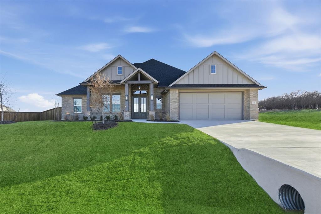 HELLO PRICE IMPROVEMENT!! Brand new construction in Settler’s Glen, New Fairview – Where Space Meets Serenity!! This beautifully crafted custom home by Structured Custom Homes is designed with exceptional attention to detail, both inside and out with many upgrades! Featuring an open-concept floor plan with refined finishes throughout, this residence highlights the signature craftsmanship Structured is known for. A grand entry with stunning double doors welcomes you into a bright, airy living space. The living area offers a wood-burning fireplace and custom built-ins with concealed storage, blending function with style. The gourmet kitchen is a true showpiece, complete with stainless steel appliances, custom cabinetry, a large center island, and a generous walk-in pantry. The thoughtfully designed split-bedroom layout ensures privacy for the owner’s suite, which includes a spacious bathroom with dual vanities, a freestanding soaking tub, and a large walk-in closet with direct access to the laundry room for added convenience. On the opposite side of the home, you'll find spacious secondary bedrooms and a versatile flex room, ideal for a home office or game room. Step outside to a large, covered patio—perfect for entertaining or relaxing while taking in the peaceful surroundings. The home sits on half an acre giving you space to build your dream oasis. Call today for more information!!