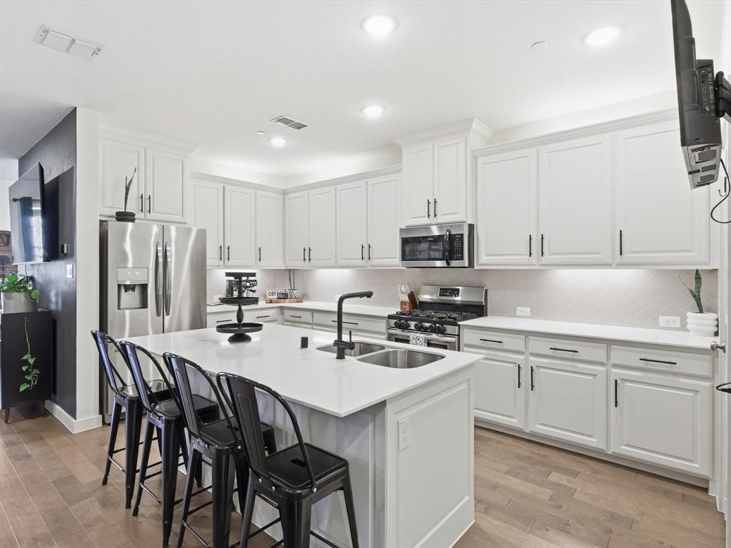 Priced to sell, this well-maintained 3-bedroom, townhome is located in the desirable Apple’s Crossing community in Fairview. The home features a bright, open, and functional floor plan filled with natural light and thoughtfully selected finishes throughout. The main level offers a comfortable living area that flows seamlessly into the dining space and kitchen, creating an ideal layout for both everyday living and entertaining. A convenient half bathroom is also located on the main floor, ideal for guests. The open-concept design enhances the sense of space while maintaining a warm, inviting feel. Upstairs, you’ll find three bedrooms, two full bathrooms, and a generously sized laundry area for added convenience. The private primary suite is thoughtfully positioned and features his-and-her walk-in closets, along with an ensuite bath offering dual vanities and a spacious walk-in shower. The secondary bedrooms each include walk-in closets and are conveniently located near a full hallway bathroom with dual sinks and a tub-shower combination.  An oversized two-car garage provides additional storage and functionality. 

Located in McKinney ISD, this home also provides quick access to major highways, plus shopping, dining, and entertainment nearby. HOA dues include exterior lawn maintenance, landscaping, and a master insurance policy on the dwelling, offering true low-maintenance living.
