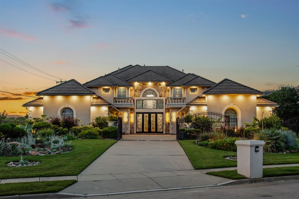 Popular Toll Brothers Mediterranean Estate! Modern design, in one of Flower Mound's most sought-after communities, The Sanctuary. Situated on a .60-acre homesite in one of the many neighborhood cul-de-sacs, this exceptional Toll Brothers home offers over 7,000 square feet of thoughtfully designed, contemporary beauty, with multiple large, living spaces, entertainment-bar area, an outdoor retreat!

A striking tile roof, elevated architectural details, and meticulously curated drought-tolerant landscaping create unforgettable curb appeal. Inside, expansive living spaces are designed for grand-scale entertaining and comfortable everyday living. The open-concept floor plan features five spacious bedrooms, five full and 1 half bath, including a luxurious primary retreat and an additional bedroom suite conveniently located on the first floor.

Designed with modern living in mind, the home is equipped with an advanced smart home system and showcases sophisticated finishes throughout. A private study, sunroom, multiple living and gathering areas, and abundant natural light provide exceptional flexibility for today's lifestyle.

Upstairs, enjoy a massive game room, dedicated media room, three additional bedrooms, and a stunning terrace overlooking the resort-style backyard. Outdoor living reaches new heights with a sparkling pool and spa surrounded by intentional, professionally designed landscaping that offers beauty, privacy, and low-maintenance enjoyment year-round.

Car enthusiasts and hobbyists will appreciate the rare six-car garage, while the home's premier location places residents just minutes from Flower Mound's top-rated schools, shopping, dining, parks, and major commuter routes, and proximity to DFW airport.

A rare opportunity to own an extraordinary luxury residence in one of Flower Mound's most prestigious neighborhoods.