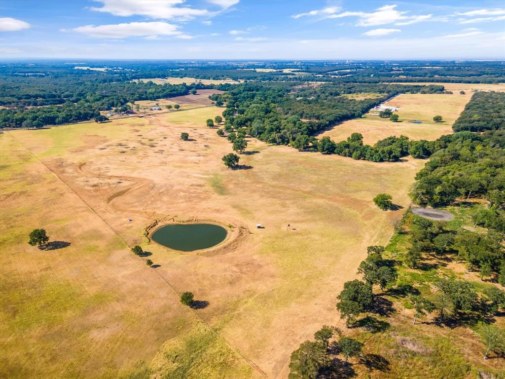 Check out this beautiful peace of land located in Hill County! This is the first time this has been offered for sale in over 100 years! Beautiful rolling hills and oak trees dot the landscape. Property is fully perimeter fenced, with access on FM 934 and HCR 1414. There is a pipe fence on the highway with cattle chute and holding pen. There are two tanks on the property and a dry creek bed that runs through. The property is AG exempt, perfect for grazing livestock or even to plant and cultivate hay. Several great locations for a home site if you decide to build a home. There are no known restrictions on the property. Don't miss out on this lovely piece of Hill County, so many opportunities!