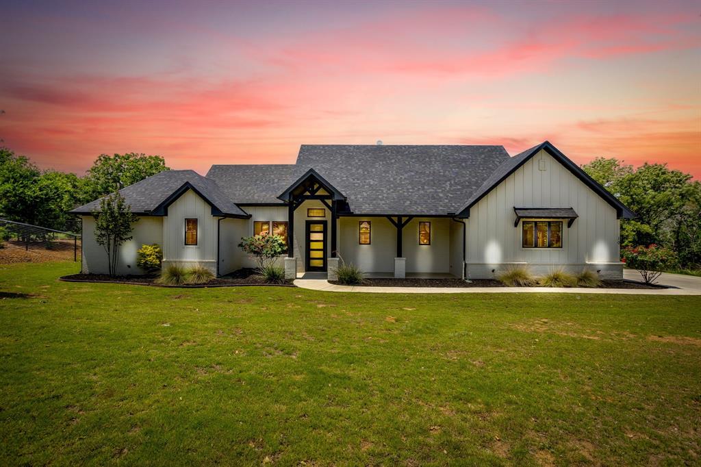 This beautifully built 4 bedroom, 2.5 bathroom home completed in 2022 and perfectly positioned at the end of a quiet cul-de-sac in sought-after Millsap ISD. Located just minutes from the elementary school, this property offers peaceful country living with quick access to Hwy 180 and Interstate 20 for an easy commute.

Inside, you’ll love the bright natural light, soaring high ceilings, and open concept layout that make the home feel both spacious and inviting. Designed with a split-bedroom floorplan, this home offers privacy and functionality for the whole family. The spacious primary suite is a true retreat featuring a large ensuite bathroom with a soaking tub and an oversized dream closet with plenty of storage space.

The heart of the home is the oversized island kitchen absolutely perfect for entertaining! Complete with double ovens, a gas range, pot filler, and tons of prep and gathering space, this kitchen was designed for hosting with ease.

With both an indoor and outdoor fireplace, this property is the perfect blank canvas to create the cozy country lifestyle you’ve been dreaming of. Whether it’s relaxing fireside on chilly evenings, roasting s’mores under the Texas sky, or designing the ultimate outdoor oasis complete with a pool, kitchen, and entertaining space the possibilities here are endless.

Enjoy the best of both worlds with quiet country living while still being close to everything Mineral Wells has to offer, including the famous state trailways, Crazy Water hotel, downtown shopping, restaurants, and nightlife.

Modern comfort, smalltown charm, and room to make it your own this one is ready to welcome you home!