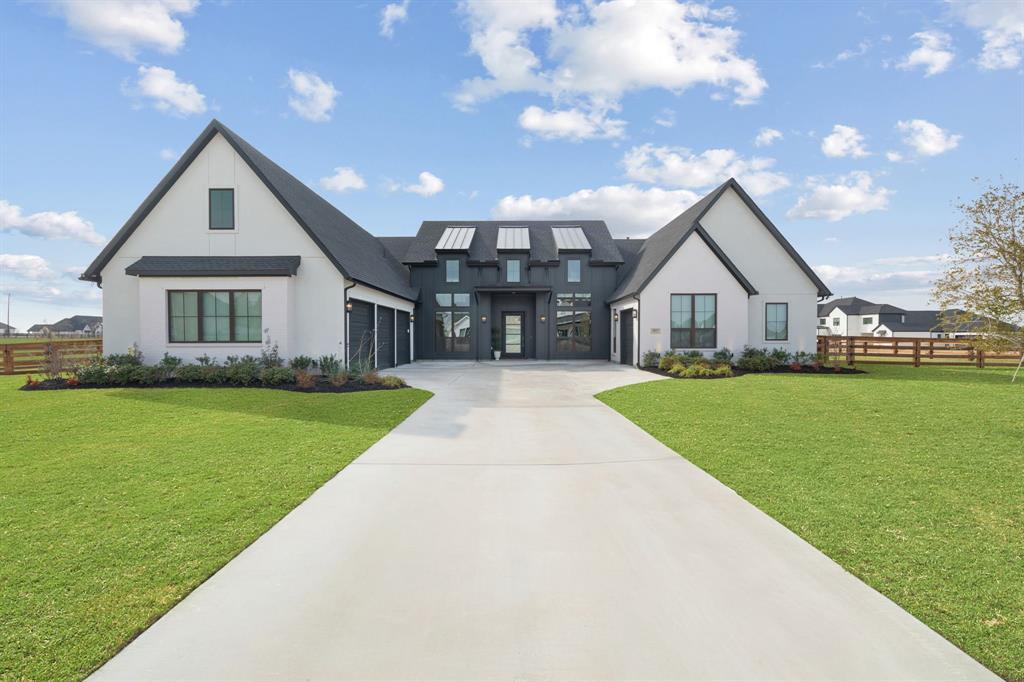 This exceptional Toll Brothers residence showcases nearly every premium upgrade offered by the builder, further elevated by extensive custom enhancements completed after closing, creating a truly one-of-a-kind home that stands apart from standard new construction.

Designed for luxurious single-story living, a welcoming foyer leads past a private, color-drenched office with beautiful custom built-ins into a breathtaking great room, where expansive sliding glass doors open to an oversized covered patio for seamless indoor-outdoor living and entertaining.

At the heart of the home, the chef’s kitchen is a true statement piece, featuring an oversized waterfall honed quartz island with breakfast seating, dramatic quartzite countersplash, a Sub-Zero refrigerator, abundant upgraded cabinetry with under- and upper-cabinet lighting, and a generous walk-in pantry.

The expansive primary suite offers a private retreat with dual custom-finished walk-in closets and a spa-inspired bath complete with dual vanities, a soaking tub, oversized luxe shower with three shower heads, linen storage, and a private water closet. Each secondary bedroom includes its own en-suite bath and walk-in closet, offering comfort and privacy for family and guests.

A spacious flex room serves perfectly as a game or media room, anchored by a stunning custom-built entertainment wall with exceptional storage. Additional post-closing custom built-ins throughout the home add both beauty and thoughtful functionality, enhancing what was already an extensively upgraded floorplan. A powder bath with direct outdoor access offers the ideal setup for a future pool bath.

A rare opportunity to own a highly customized, designer-finished Toll Brothers home where nearly every detail has been thoughtfully elevated beyond the builder standard.

Zoned for the new middle school in Pecan Square opening Fall 2026.