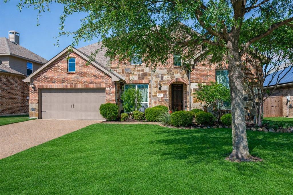 Welcome to 1501 Kirkwood Lane in Prosper, perfectly positioned on a spacious lot in the sought after Lakes of Prosper, just off Prosper Trail and the Dallas North Tollway. This prime location offers convenient access to shopping, dining, and commuting, while being just a short walk to Frontier Park and the stadium. Wonderful community amenities including a pool, parks, scenic walking trails, and catch and release fishing, all within highly acclaimed Prosper ISD. From the moment you arrive, the home impresses with beautiful curb appeal, lush landscaping, and stone edged flower beds. Inside, this custom built Highland Homes residence showcases rich nail down hardwood floors throughout the hallway, entrance and dining room area. A thoughtfully designed layout ideal for everyday living and entertaining. Executive study with double glass doors creates the perfect work from home space, while a stylish powder bath offers convenience for guests. The formal dining room, enhanced with crown molding, is ready for holiday gatherings and special occasions. The inviting living room features a striking stone gas fireplace and flows seamlessly into the gourmet kitchen, complete with knotty alder cabinetry, granite countertops, stainless steel appliances including a double oven and five burner gas cooktop, under cabinet lighting, and a designer stone and glass backsplash. A large island, walk in pantry, and butler’s pantry connecting to the breakfast nook create both function and charm, with the perfect space for a coffee bar. The private primary suite offers a relaxing retreat with dual vanities, a makeup area, separate tub and shower, and a spacious walk in closet with direct access to the laundry room. Upstairs, enjoy an oversized game room, three generously sized bedrooms, and two full bathrooms. A large backyard featuring an oversized 15x19 extended patio, ideal for outdoor entertaining, grilling, and enjoying Texas sunsets. A two car oversized garage completes this floorplan.