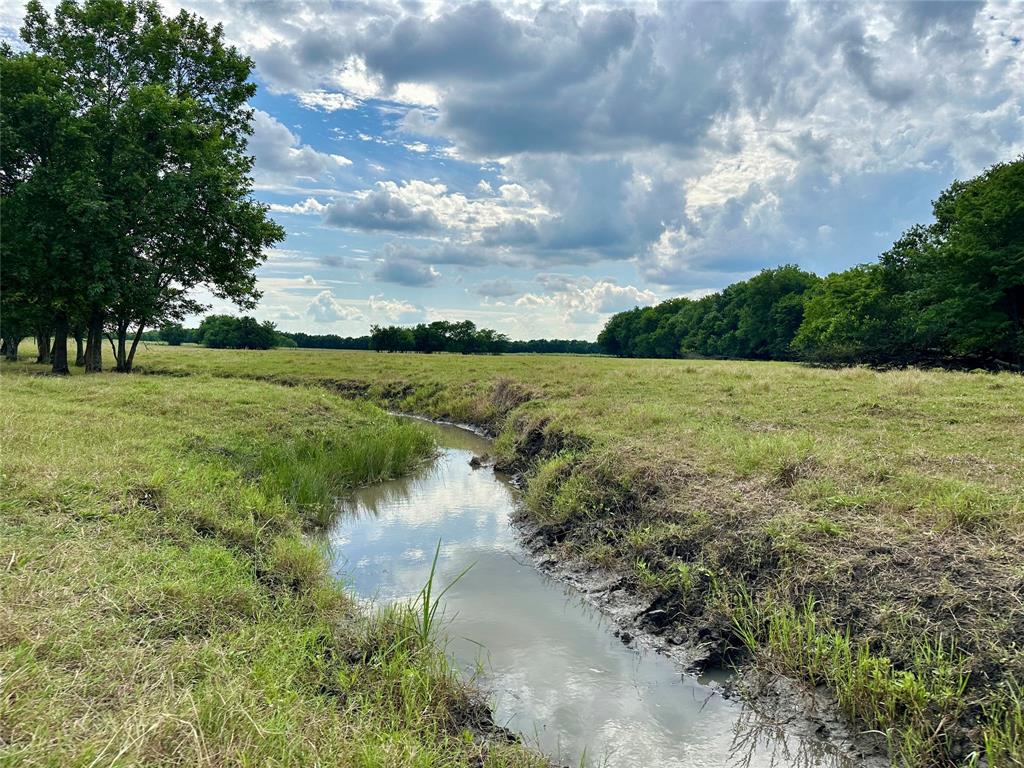 J WOODS TRACT 1 ACRES 100.57 - Land