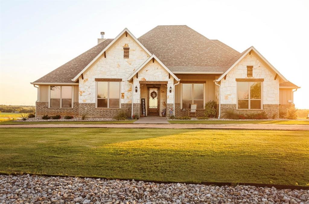 Welcome to this beautifully designed 2023 model home featuring 3 bedrooms, 2 full bathrooms, 1 half bath, and modern finishes throughout. The spacious master suite includes a huge walk-in closet for ultimate convenience and comfort. Enjoy breathtaking lake views right from your backyard, perfect for morning coffee or evening relaxation. Fishing access at the lake adds to the outdoor lifestyle, and you'll love watching deer roam freely through the area-nature at your doorstep. This home offers the perfect blend of tranquility and contemporary living, ideal for anyone looking for a peaceful lakefront retreat. Don't miss this rare opportunity- schedule your showing today.