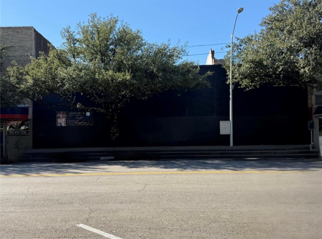 This commercial gem is truly a blank slate!
 This is a commercial redevelopment opportunity in downtown Corsicana on N Beaton St. It is in a high traffic area on the busy street of Beaton. Within walking distance there are many other businesses, restaurants and shops. Prime location with over 10,000 sq.ft. 
Improvements are in shell condition following completed asbestos abatement with documentation, offering a clean starting point for renovation or new construction. Slab foundation on one portion; dirt floor on adjoining section. Sold as-is. Buyer and Buyer's agent to verify zoning and intended use.
Seller is motivated so make an offer!