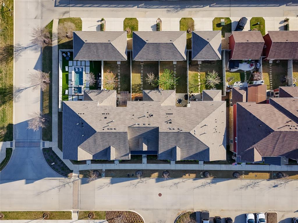 Looking for a low-maintenance townhome in Northlake with resort-style amenities and flexible living space? Welcome to 2737 S Market Square, where comfort, style, and convenience come together in the highly sought-after Pecan Square community. Filled with natural light, this thoughtfully designed open-concept floor plan showcases plantation shutters, upgraded finishes, and a versatile flex space perfect for a home office, guest room, or fitness area.

The spacious kitchen offers abundant storage with two pantries, making organization and meal prep effortless. Relax with your morning coffee on the inviting front porch or unwind on the private back patio featuring a low-maintenance yard designed for easy outdoor living. A two-car garage adds everyday convenience and extra storage.

Residents of Pecan Square enjoy an unmatched lifestyle with exceptional amenities and a vibrant sense of community. Conveniently located in Northlake, this home offers easy access to shopping, dining, entertainment, and major commuter routes throughout North Texas.