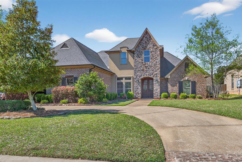 **Exquisite Elegance in Shreveport's Prestigious Southern Trace Community**

Discover a sanctuary of unparalleled luxury and timeless elegance in the heart of Shreveport, Louisiana. This stunning Global Luxury property offers five spacious bedrooms, four lavish baths, and a generously appointed three-car garage, promising a lifestyle of grandeur and comfort.

As you step inside, you're greeted by an expansive open floor plan that seamlessly blends sophistication with modern living. The gourmet kitchen, a culinary dream, stands at the center of the home, featuring top-of-the-line stainless steel appliances, custom cabinetry, and a sprawling island with a prep sink perfect for both casual dining and entertaining. Adjoining the kitchen is an elegant dining area, flowing effortlessly into a grand living room adorned with a cozy fireplace and large windows that flood the space with natural light. There is a large playroom and a separate bonus room that has a wet bar with a refrigerator.

The primary suite is a true retreat, offering a private oasis complete with a spacious walk-in closet and an opulent en-suite bath, featuring a soaking tub, separate large walk-in shower, and dual vanities. Additional bedrooms are thoughtfully designed, providing ample space and privacy, ideal for guests or a flexible home office setup.

Step outside to discover beautifully landscaped grounds that extend the living space outdoors. The inviting patio is an entertainer's dream, ideal for hosting celebrations or enjoying serene evenings under the stars. The inground gunite pool and spa will be great for the coming hot summer months.

This remarkable property is impeccably crafted for those who appreciate luxury and style, marrying comfort with an upscale lifestyle in one of Shreveport's most coveted neighborhoods. Experience the pinnacle of refined living, where every detail has been meticulously curated to provide the ultimate in modern elegance.
