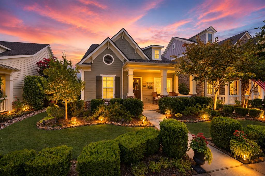 Welcome to Tucker Hill, one of McKinney's most sought-after master-planned communities, where timeless architecture, tree-lined streets, and exceptional amenities create a lifestyle that's second to none. Located in highly acclaimed Prosper ISD, this beautifully maintained home combines luxury finishes with warm, inviting living spaces designed for everyday comfort and effortless entertaining. Enjoy relaxing mornings on the charming front porch or unwind year-round beneath the expansive covered back patio complete with an outdoor kitchen and beautifully landscaped backyard. A private side garden with a tranquil fountain creates another peaceful outdoor escape. Step inside to rich hardwood floors and an open-concept layout filled with natural light. The chef's kitchen is the heart of the home, featuring granite countertops, stainless steel appliances, double ovens, a gas cooktop, oversized island, and abundant cabinetry, all flowing seamlessly into the spacious living and dining areas. The primary suite offers a true retreat with a stunning fully remodeled spa-inspired bath, showcasing an oversized walk-in shower with dual vanities and elegant custom finishes. Every detail has been thoughtfully cared for, blending classic charm with modern updates throughout. Thoughtful architectural details, including extensive trim work and crown molding, complement the home's timeless design. Residents of Tucker Hill enjoy resort-style amenities including parks, playgrounds, miles of trails, community events, green spaces, and the iconic Founders Square, all designed to foster a true neighborhood feel. Conveniently located near shopping, dining, major highways, and everything McKinney and Prosper have to offer, this home delivers the perfect combination of luxury, community, and convenience.