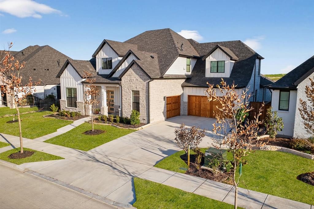 Welcome to your stunning custom-built home in the highly sought-after Walsh Ranch within Aledo ISD. Perfectly positioned on a premium lot with ample space for a future pool, this property offers breathtaking views of the greenbelt and Lake Park. Enjoy these serene surroundings from the covered patio featuring an outdoor gas fireplace, or from the oversized upstairs decks which is one of the only in the neighborhood—ideal for entertaining or relaxing evenings.

As you step inside, you’re greeted by a grand entry with soaring 20+ foot ceilings that immediately set the tone for the home’s elegance. The gourmet kitchen is a chef’s dream, complete with a large center island, farmhouse sink, top-tier appliances, a built-in nugget ice maker, and a spacious walk-in pantry. The adjacent living room boasts vaulted ceilings, custom built-ins, a convenient gas fireplace, and a multi-panel glass slider opening seamlessly to the backyard.

The first-floor owner’s retreat offers a spa-inspired bath with four shower sprays, a soaking tub, a large walk-in closet, and a built-in coffee bar. A private guest suite with its own bath and exterior entrance is also located on the main level. Additional downstairs features include a dedicated home office with hidden storage, a stylish wine bar, and a media room with a mounted projector and surround sound.

Upstairs, three bedrooms each include their own bathrooms, along with a game room featuring a wet bar and access to the oversized deck. The three-car garage includes epoxy floors, tankless water heaters, EV charging, and room for extra workspace. Thoughtful upgrades, abundant natural light from the many windows and recessed light throughout, and luxury finishes make this home truly one of a kind—move in today.

Listing agent is one of the sellers.