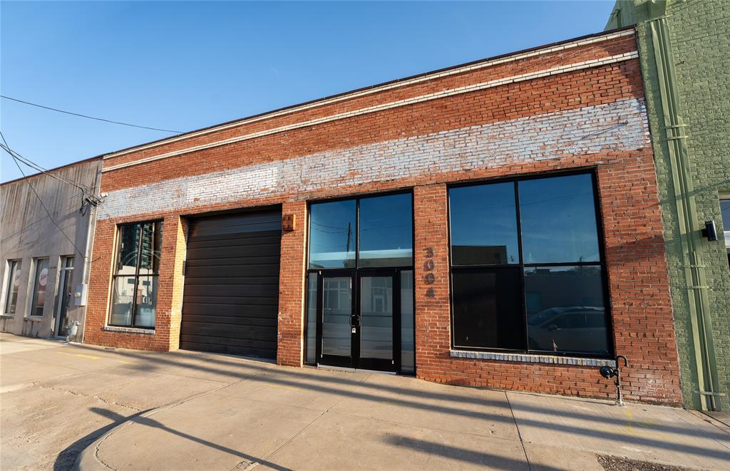 The character-rich property is located in the heart of Deep Ellum and features exposed brick interiors, wood-decked ceilings, and full storefront windows providing abundant natural light. 
The property also includes a grade-level door, semi-dock loading, and approximately 18’ clear height, offering a flexible layout suitable for retail, showroom, creative office, or live work use.