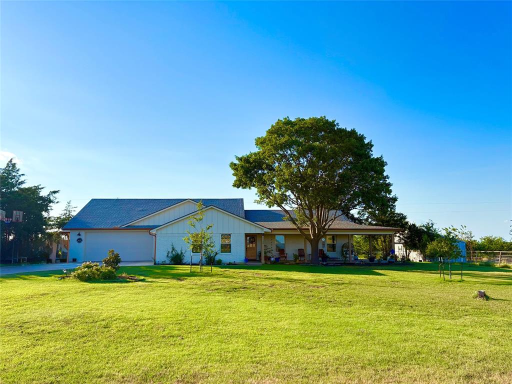 Picturesque Texas living! Renovation + New Construction Addition Ideally located near Waco & Woodway with easy access to Hwy 6 and just about 1.5 hrs from both Austin and Dallas! This home has it all: 5 bedrooms, 4 full bathrooms, 2 living spaces, office on 7 acres with SEASONAL POND, fenced GARDEN with garden beds, ~1000+ sqft BARN with stalls + feed room and ~375 sqft WORKSHOP (both have water & power). Popular Crawford ISD, NO CITY TAXES! NO KNOWN RESTRICTIONS & ready for your big plans: FENCED & CROSS FENCED with pastures so bring your horses, livestock & homestead ambitions! The show stopping kitchen has beautiful Taj Mahal quartzite countertops, natural white oak, Moroccan handmade tile, Cafe appliances & slow-close custom cabinetry. In fact, there is high end design finishes throughout like Carrara marble counters & designer tile. Dining nook overlooks seemingly endless pastures beyond, making every meal one spent over a million dollar view. The natural light filled Butlers pantry with counters is made for meal prep, hosting & storing kitchen essentials. Laundry room has exterior access & space for storage or extra fridge. Tucked away primary suite is an oasis by the laundry for utmost convenience. The dreamy ensuite has custom vanity flanked by a scalloped tiled shower & soothing freestanding tub set under windows. The main living room has a grand vaulted ceiling, fireplace, white oak mantle & custom bench. Off the main living room is the 2nd living space, natural light filled OFFICE & guest bedroom with its own ensuite bathroom-great for multigen living! Down the hall are 3 bedrooms, another with its own beautiful ensuite bath. Take in gorgeous views of farmland & treed pastures from the quintessential wrap-around front porch + vaulted back porch both with natural wood tongue + groove ceilings. Many established and newer TREES. Reno+addition: roof, plumbing, electrical, tankless water heaters, HVAC, ductwork, porches, storage space above garage,etc.