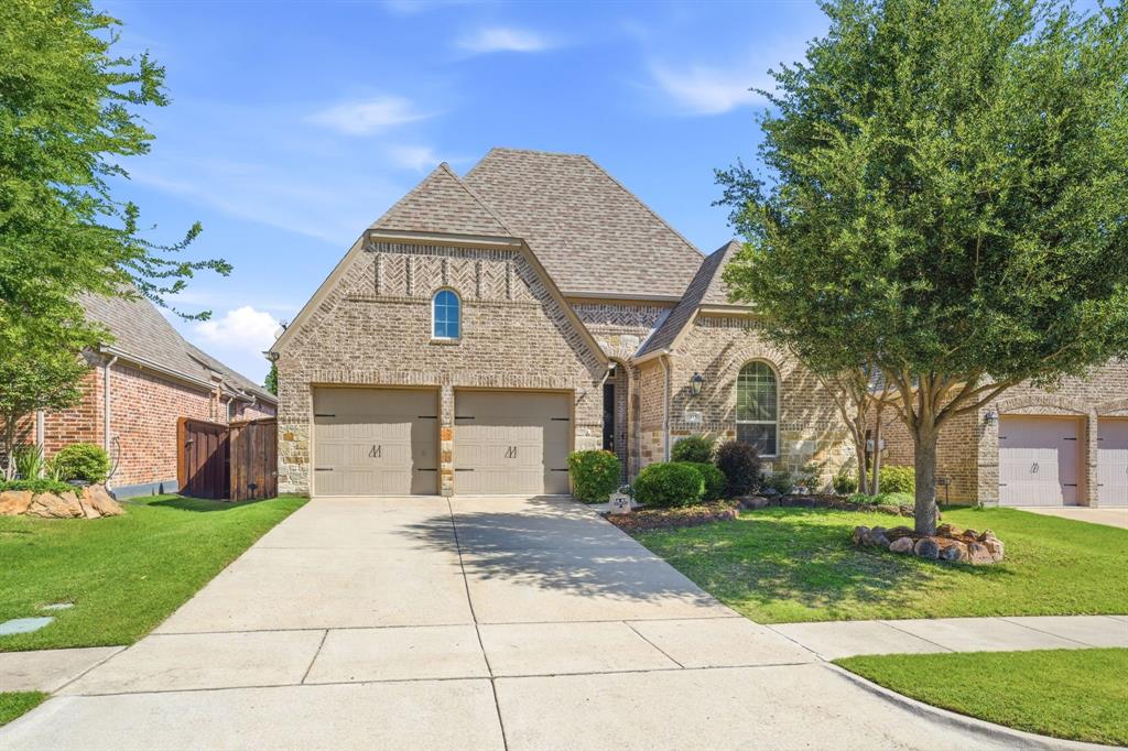 Nestled in the sought-after Trinity Falls community, this beautifully designed single-story home offers over 2,000 square feet of thoughtfully designed living space with four spacious bedrooms and three full baths. Filled with natural light, the open concept layout creates an inviting atmosphere ideal for both everyday living and entertaining. The inviting living room is anchored by a lovely stone fireplace and opens seamlessly to the dining area and the beautifully appointed kitchen, featuring a large island with seating, a gas cooktop, a walk-in pantry, abundant workspace, neutral colors, and decorative lighting. Retreat to the expansive primary suite with peaceful backyard views and an ensuite bathroom featuring double sinks, a large garden tub, a walk-in shower, and a spacious walk-in closet. One of the secondary bedrooms offers an ensuite, complete with a walk-in shower, ideal for guests or multigenerational living. Lovely landscaping enhances the home’s curb appeal while the convenient location near Highway 75 provides easy access to shopping, dining, and commuting. Enjoy all the exceptional amenities, scenic trails, parks, and community spaces that make Trinity Falls such a desirable place to call home.