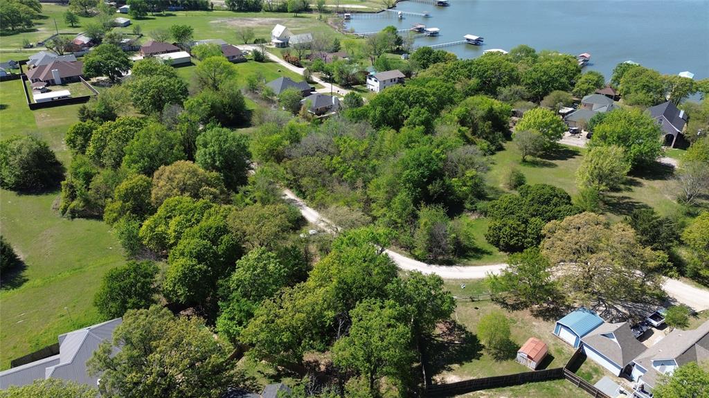 5 side by side lots for sale in a lake front community! City water and city sewer available. Boat ramp in subdivision. Located next to the city lake front park with pickle ball, basketball, picnic area, swim area, and boat ramps. Build only lots. All information is approximate, buyer and buyers agent to verify.
