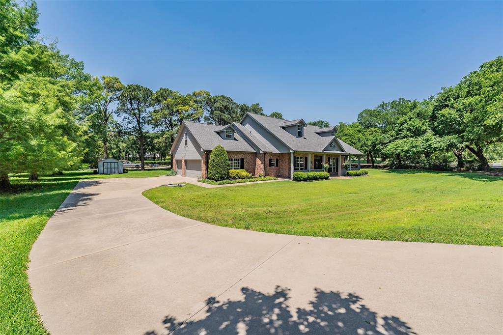 Escape to this beautifully updated retreat on just under an acre in the heart of North Keller, offering a rare “country feel” with scenic tree-lined roads just minutes from city conveniences and within the sought-after Keller High School feeder pattern. Convenient access to Hwy 170 allows for an easy commute to Fort Worth and DFW Airport. This extensively renovated home features wood floors downstairs, new carpet upstairs, fresh designer paint, and updated lighting, ceiling fans, hardware, and fixtures throughout. The gourmet kitchen is a standout with quartz countertops, soft-close cabinetry, under-cabinet lighting, backsplash, double ovens, convection microwave, and gas cooktop, all open to the family room with picturesque views of the backyard. Enjoy true outdoor living with a remodeled heated saltwater pool and spa featuring travertine coping, tile, decking, and updated plaster, surrounded by mature trees and wrought iron fencing. The spacious patio is plumbed for a gas grill, perfect for entertaining. The private primary suite offers a see-through fireplace, patio access, and a spa-like bath with frameless shower, garden tub, dual sinks, and dual walk-in closets. Upstairs includes 3 bedrooms with walk-in closets, updated baths including a Jack-and-Jill layout, and a large game room.
Additional highlights include an oversized 3-car garage with sink, a functional laundry room with abundant storage, dual staircases, walk-in attic, Class IV roof, dual water heaters, and well-fed irrigation for lower water costs. Move-in ready with exceptional upgrades throughout.