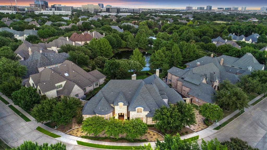 CONTRACT TERMINATED AT NO FAULT OF THE SELLER. Breathtaking Custom Home in gated Stonebriar Park overlooks pond and fountain! Backyard paradise with pool, spa and outdoor living area with fireplace, spacious yard, and built-in grill. This home is designed with entertaining in mind and has a highly sought-after media and game room on the first floor, living and dining have French doors leading out the magnificent patio, spacious study w built-ins, a wine cellar and wet bar. Gourmet Kitchen with granite counter tops, butler’s pantry and large island with breakfast bar and professional grade appliances. Downstairs Master suite has walls of windows and elegant bath with its own laundry and exercise room. Guest suite with full bath down and three bedrooms with walk in closets and en suite baths up with additional living area.