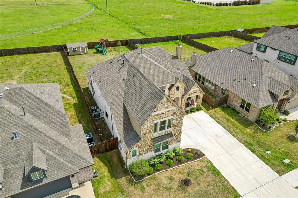 MOTIVATED SELLER! Welcome to this spacious 5 bedroom, 4.5 bathroom home in the desirable Clairmont Estates community of Ponder. Built in 2023, this nearly new home offers more than 3,700 square feet of thoughtfully designed living space with a flexible floor plan ideal for multigenerational living, large households, or those seeking additional space to work and entertain.

The open concept layout features an oversized living area with a fireplace that flows seamlessly into the kitchen, complete with modern appliances, abundant cabinetry, generous counter space, and ample storage. Designed for both everyday living and entertaining, the home also includes a dedicated home office, formal dining area, game room, and media room.

A standout feature of the home is the secondary living area paired with a private secondary primary suite, creating an ideal setup for multigenerational living, an in law suite, extended guests, or a private retreat for family members. The primary suite offers generous space and an ensuite bath designed for comfort and convenience.

Large windows throughout provide abundant natural light, enhancing the home's spacious feel. Additional features include multiple living areas, well sized secondary bedrooms, plentiful storage, and an attached garage.

Situated on a generously sized lot, the property offers ample outdoor space for recreation, relaxation, or future customization.

Located within Ponder ISD and convenient to Denton, Alliance Corridor employment centers, and the DFW Metroplex, this home combines modern construction, versatile living spaces, and a desirable Denton County location. With dual primary suites, a media room, game room, home office, open concept design, and flexible floor plan, this property offers the space and functionality today's buyers are seeking.
