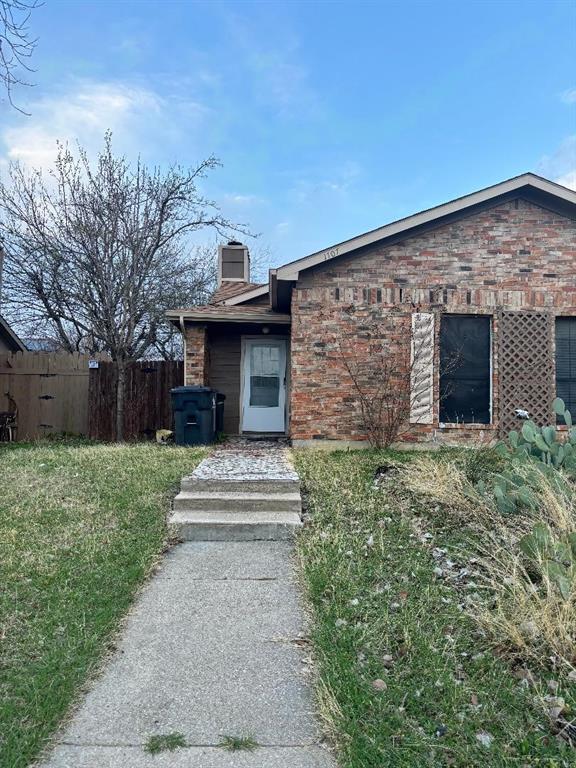 Half duplex with 3 bedrooms and 2 baths. Needs work. Large living room with vaulted ceiling and wood burning fireplace. Kitchen, dining and living room are open. Kitchen has breakfast bar. Split bedrooms for some privacy with a courtyard off the master suite.