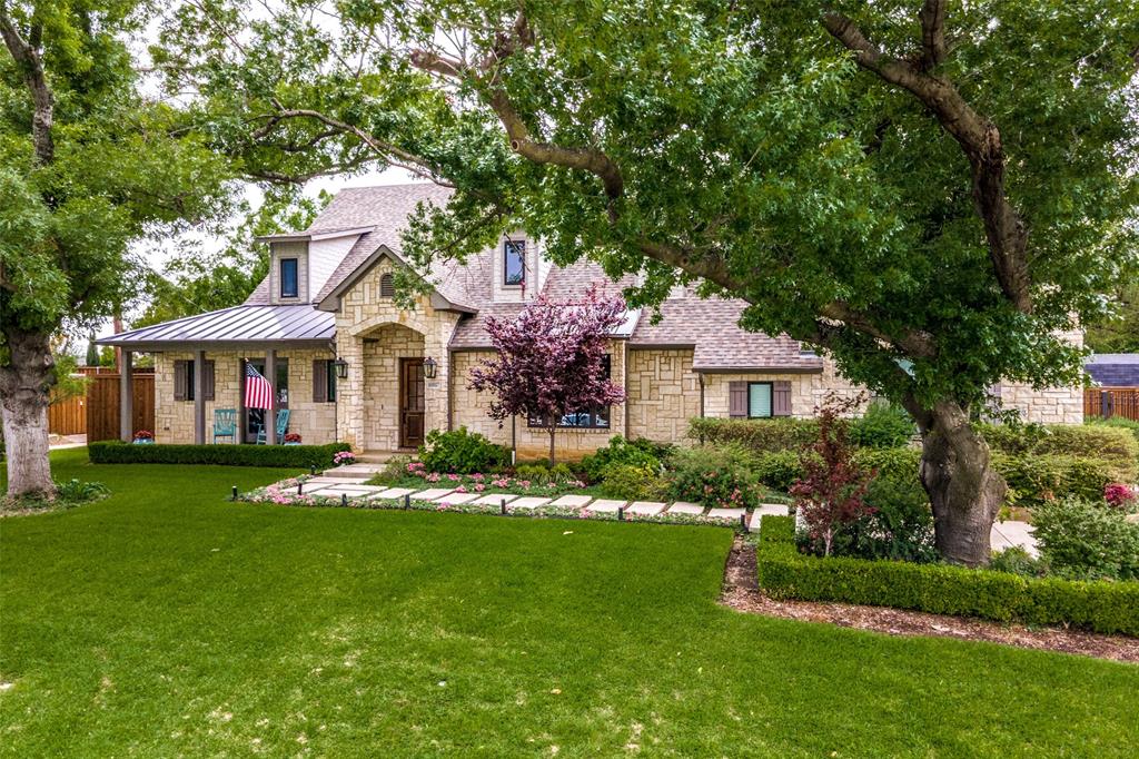 A real Texas beauty. Spacious well lit home, large bright rooms, hardwoods throughout, dining room, study and family room w wood burning fireplace opens to a patio with another fireplace.  Lovely private backyard with beautiful pool and spa. Family room flows to kitchen that has triple Viking ovens, gas range w grill and 2 dishwashers. Upstairs living area with a view of the backyard and a cozy media room with a 82 inch TV. includes wet bar with wine storage nook. Beautiful Facade of native limestone, professionally landscaped, pool, spa and putting green. Half of the backyard has synthetic turf. First floor master with his and her bathrooms, walk-in closets.  3 car detached garage. Two of three floored attics have full-sized doors, easy access!  All four bedrooms have bathrooms en suite & walk in closets.  Lots of storage throughout the home. House is equipped with sound system, security cameras and gate.