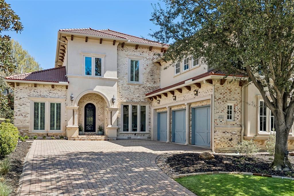 Exceptional Las Colinas luxury estate in the exclusive gated and guarded Enclave at Windsor Ridge with 2 downstairs bedrooms! Ideally positioned within a golf cart ride to the Ritz Carlton & Byron Nelson Sports Club, this impressive 5,631 SF residence blends timeless architecture with modern sophistication. Featuring a dramatic 20-foot entry behind a custom wrought iron door, the foyer is flanked by a formal dining room, ensuite guest room, private study with coffered ceilings, and a wet bar with wine storage. The open-concept family room with fireplace is designed for seamless indoor-outdoor living with double doors that open to a covered patio overlooking a lush community greenbelt.  The updated chef’s inspired kitchen is equipped with a large island, walk-in pantry, gas range and new Bosch oven and microwave. A light-filled, curved breakfast nook opens to a private patio. The luxurious primary suite enjoys views to the greenbelt and features a fireplace and an UPDATED bath!  Guests will enjoy the downstairs private suite with ensuite bath and walk in closet.  Upstairs offers two additional ensuite bedrooms, space for a fish tank if desired and 3 living spaces.  The media room is an entertainer’s dream with room for theater seating, a separate area for game or pool table and an amazing wet bar! The new owner will enjoy the dedicated fitness space that can also house a custom built golf simulator. The separate upstairs game room is light filled and features a private balcony overlooking the front of the home. Additional highlights include a mudroom with built-ins, oversized laundry with quartz counters and bonus refrigerator, and a 3-car garage. Future-ready features include elevator pre-planning and potential for a second primary suite. Recent upgrades include a Class 4 synthetic tile roof, energy-efficient Pella windows in the front of the home, smart lighting, smart irrigation, LED landscape lighting, remodeled powder bath, and new Bosch appliances.