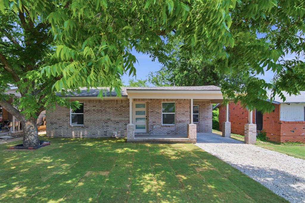 Completely Rebuilt from the Inside Out! This stunning home offers the rare opportunity to own what feels like a brand-new house while enjoying the charm of an established neighborhood. No detail was overlooked during the extensive renovation, including foundation repairs, updated plumbing, a new roof, energy-efficient windows, new sheetrock, upgraded electrical and HVAC components, custom cabinetry, modern fixtures, and stylish finishes throughout. Inside, you'll find a bright and inviting layout with modern flooring, updated lighting, and a beautifully redesigned kitchen featuring custom cabinets and brand-new appliances. Outside, a welcoming covered front porch, new brick, mature shade trees, and a spacious backyard create the perfect setting for relaxing or entertaining. With virtually every major system and cosmetic feature updated, this truly turnkey home delivers the peace of mind buyers are looking for without the price tag of new construction.