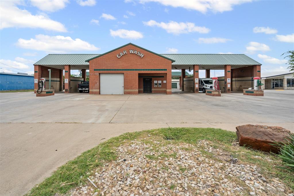 SELF STORAGE and CAR WASH combination property located in Granbury. Conveniently located in an ideal location off of Highway 377! This facility is in great condition and is an income producing property with huge upside potential. Big enough to fit your boat, ATVs, and even your RV! Self storage area has an automatic iron gate and metal fence securely enclosing the property. There is a 12x30 office, complete with restroom, that can be expanded for an owner or operator to live on-site. The 68 storage unit sizes are: 5x10, 10x10, 10x20, and 12x30. The car wash has 5 bays for self-wash. There are 7 vacuum stations - and some are combination vacuum with fragrance and some are combination vacuum and shampoo.