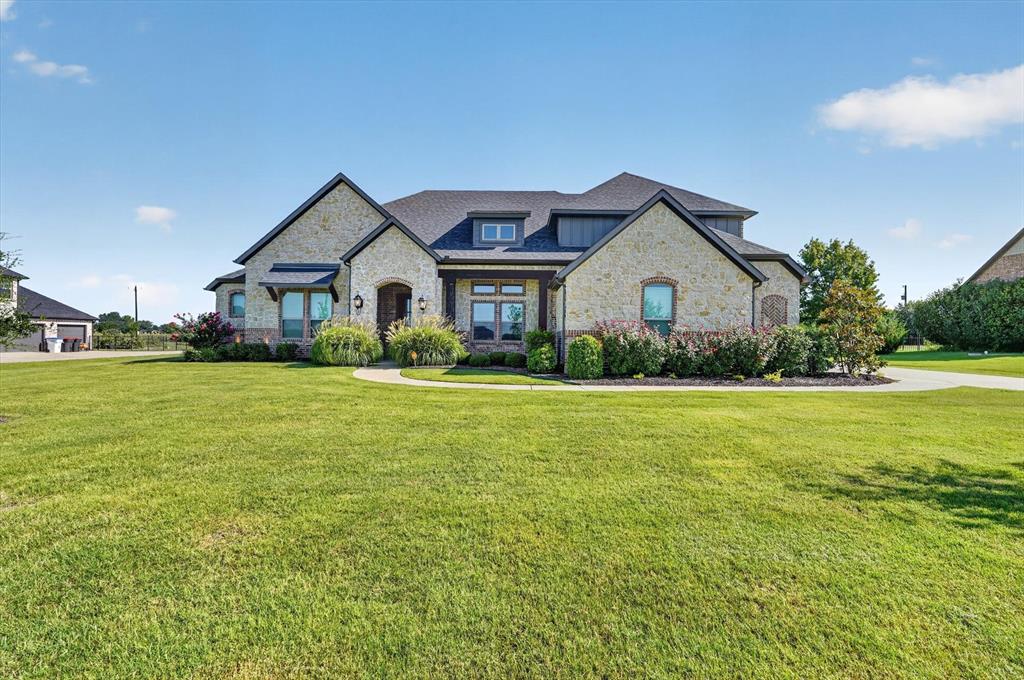 Welcome to your dream home in the sought-after gated community of Waterstone Estates! Nestled on a spacious one-acre lot that backs up to a greenbelt, this stunning 4 bedroom, 3.5-bath home, complete with an office, offers the perfect blend of luxury, comfort, and outdoor living. Step inside to an inviting open-concept floor plan featuring beautiful floors, granite countertops, stainless steel appliances with a double oven, and thoughtfully designed living spaces that are perfect for both everyday living and entertaining. The primary suite features 2 walk in closets and all secdonary bedroom have nice sized closets.  Upstairs you have a great flex space and a half bath.  The backyard is truly one of a kind. Relax year-round on the expansive covered patio complete with a fireplace, built-in grill, griddle, and smoker—ideal for hosting family and friends. Unwind in the hot tub, recharge in the sauna, or enjoy the incredible custom playground that rivals those found in many public parks, creating an unforgettable space for kids to play and explore.  HOA Amenities include a pavilion, fishing dock, basketball court, and playground.  Located in a secure gated community with the privacy of an acre-sized lot, this exceptional property offers the lifestyle you’ve been searching for. Don’t miss the opportunity to make this one-of-a-kind home yours!