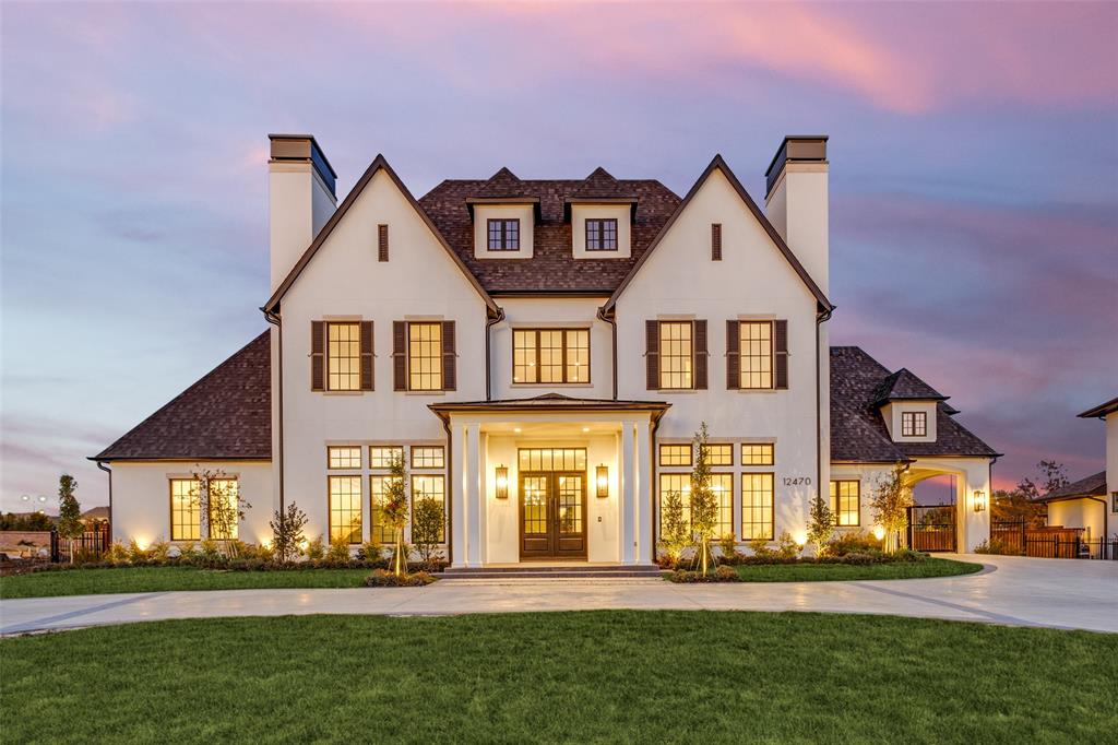 JUST COMPLETED Transitional Luxury custom with a French flair in gated destination community of Homestead in Newman Village.  Classic  Architecture showcased in streets of dreams known as the Creme de la Creme in Frisco.  This 8332 Sq. Ft. * 5 Bedroom * 5.3 Bath * 4 car garage * Porte-cochere with luxury modern interior. Formal Dining  Rm. &  Study w. matching Fireplaces creates a grand entrance gem. Refrigerated Wine Art Display cabinet, lg. serving bar and butlers pantry designed for large entertainment venues.  Huge Catering kitchen connects to pantry for perfect flow & mobility. Open kitchen has 10 x 5 ft. island as centerpiece  opens to large morning room & family room, while flowing seamlessly to outdoor living with fireplace and separate outdoor kitchen with plank ceiling & ceiling heaters for year round living comfort. Side Porte-cochere, convenient to kitchen leads to motor court & 4 car garage (one garage has glass garage door opening to back yard for in out garage party moments or displaying your prized car). Elegant Master suite down has view of expansive private back yard.  Stunning architectural ceiling details in the master bath offer  a dramatic element and a view of Zen garden from the shower creates a one of a kind spa experience!  Two staircases, ensuite bath guest bedroom down + so much more.  Upstairs is a library loft w. sitting area, a Gameroom, Media room + 3 Bedrooms + exercise room. The home has tankless hot water heating and Owens corning Comfort Plus Energy Features that surpass standards + Lutron Smart Home expandability for   comfort and cost savings.  10,812 under roof gross sq. ft. of private living in a secured gated neighborhood with tricycle friendly neighbors makes this one of  the most sought after spots in Frisco. 
Luxury finishes as you have come to expect in all Ron Davis custom Homes.