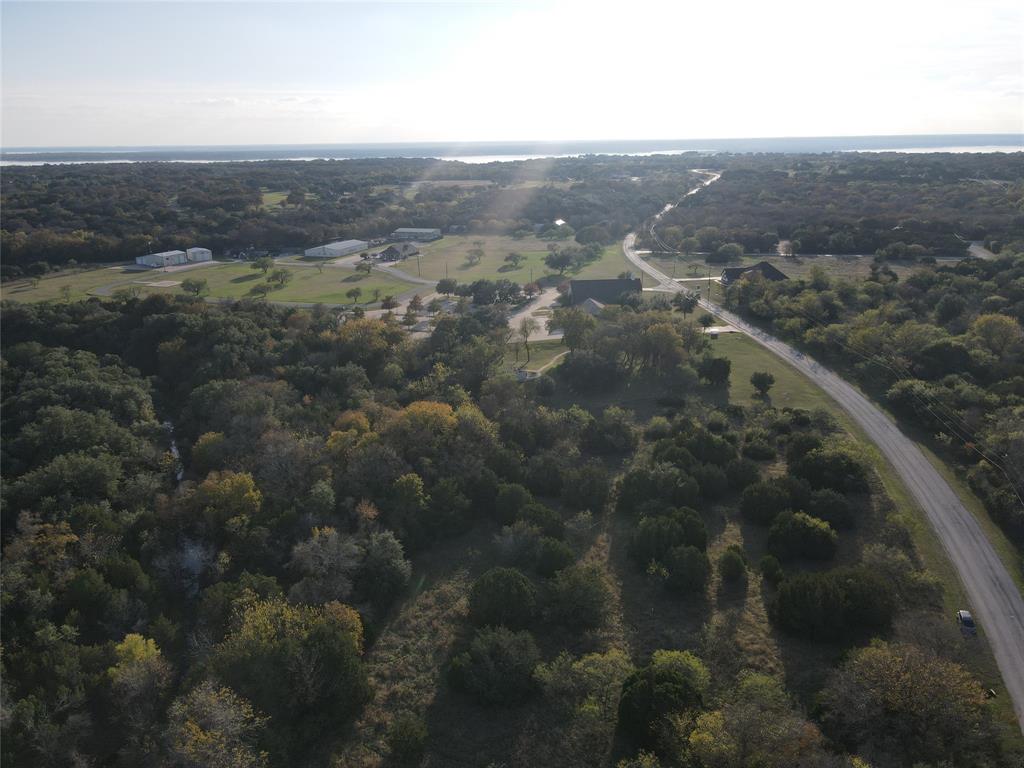 Great one acre lot in White Bluff! White Bluff is a resort community that has community pools, two golf courses, a marina, and resort accommodations. Front gate guard will only all people that are accompanied by a real estate agent.