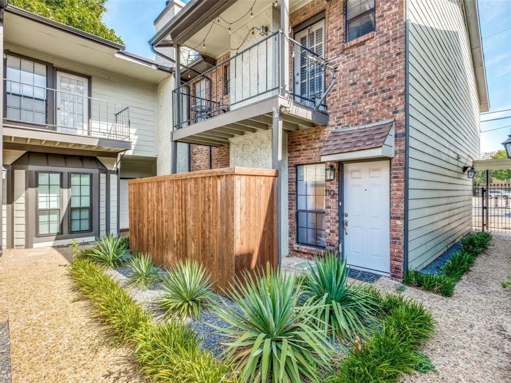 Experience stylish, low-maintenance living in the heart of Dallas at 3904 Rawlins St Apt 110. This charming two-story condo offers 2 bedrooms, 2 full bathrooms, and a half bath. It offers a comfortable living space in the desirable Courtyard Condos community.

The home features central heating and a BRAND-NEW AC unit, providing comfort and peace of mind year-round. Both bedrooms are generously sized, and the two full bathrooms make the floor plan practical for everyday living, guests, or a roommate setup.

Inside, you’ll find a warm and inviting layout with wood and ceramic tile flooring, abundant natural light, and two fireplaces that add character to both the living room and primary bedroom. The kitchen is well-equipped with a full appliance package, including an electric cooktop, electric oven, electric range, microwave, dishwasher, disposal, refrigerator, washer, and dryer.

Enjoy outdoor space from the private balcony, along with convenient parking that includes one covered carport space, guest parking, alley access, and a parking lot. The community offers a manageable HOA with monthly dues that include maintenance of the grounds and structure.

Located near Lemmon Avenue, Oak Lawn, Uptown, dining, shopping, nightlife, and major Dallas commuter routes, this condo puts you close to some of the city’s most popular destinations while still offering a comfortable residential feel.

With its central Dallas location, traditional style, two fireplaces, included appliances, covered parking, and brand-new AC unit, this Courtyard Condo is a great opportunity for buyers seeking convenience, charm, and easy city living.