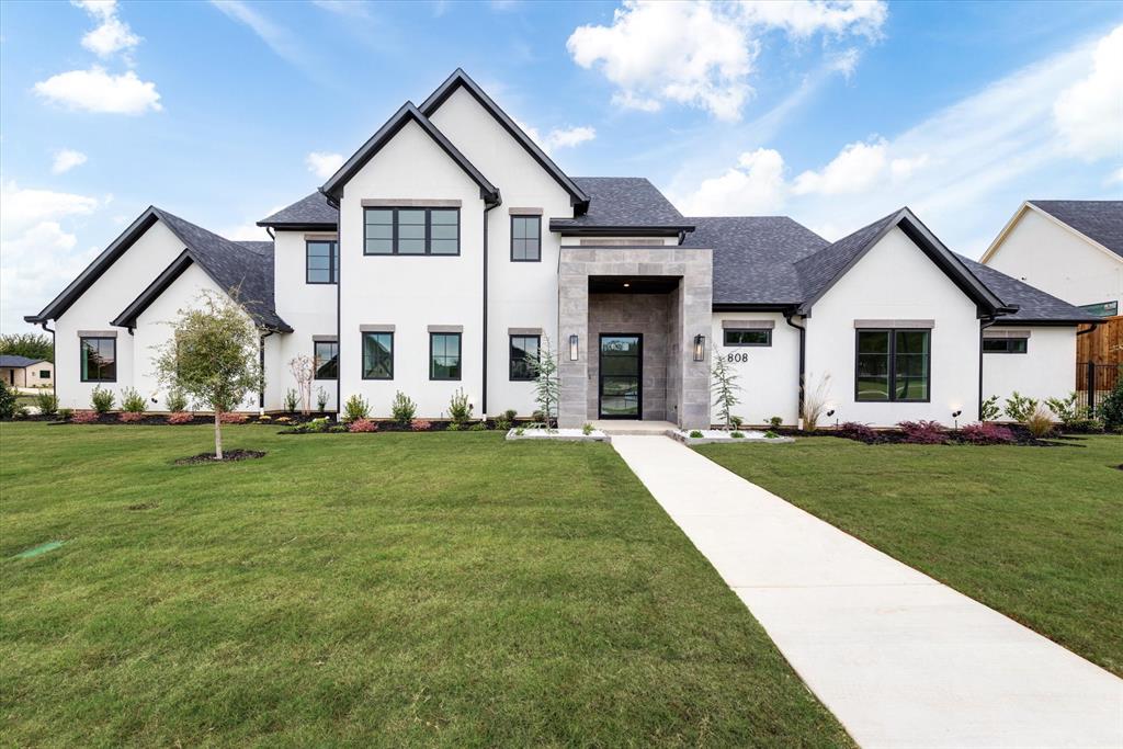 M The Builders offers another custom gem with much sought after modern clean lines in design on the exterior but transitional interior from luxury engineered wood flooring through out and tile in wet areas. 3 living areas, the Master suite, 1 guest bed and media room on the first floor and 3 additional bedrooms and a loft area up. Open clean lines, ginormous island inviting the rest of the living areas into a real family gathering space. The abundance of custom cabinetry and Anderson windows makes this home extra special from the prep kitchen wine area to the downstairs game media and then double outdoor living areas with outdoor kitchen viewing the generous size homesite. A mud room and remote patio screens for the ultimate entertainment.  Buyers choice, Colleyville or Keller Schools.