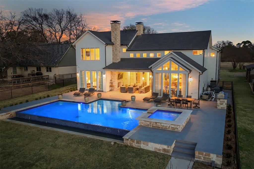 Masterfully Constructed - Intelligently Designed, this 6 BR, 5 BA Cedar Creek Lake home is perfectly located on protected water with an open water view. Floor to ceiling doors & windows provide a wonderfully bright natural-light space in which to entertain, play, & relax...or work if you must. There's a chef's kitchen with professional grade appliances & appointments; a waterside dining area with room for family & guests; and a central living area with its stone fireplace. The main floor features the Primary Suite complete with steam shower & a second bedroom & bath for special family or guests. The second floor features a 2nd Primary Suite with 2 additional bedrooms and baths. The south wing features an oversized shared bedroom (bunk room) with its own bathroom & 2nd living area. After dinner, enjoy the screened & heated patio with fireplace, take a dip in the waterside pool with wading area & spa, or take in spectacular views from the oversized boat house with party deck. (See List)