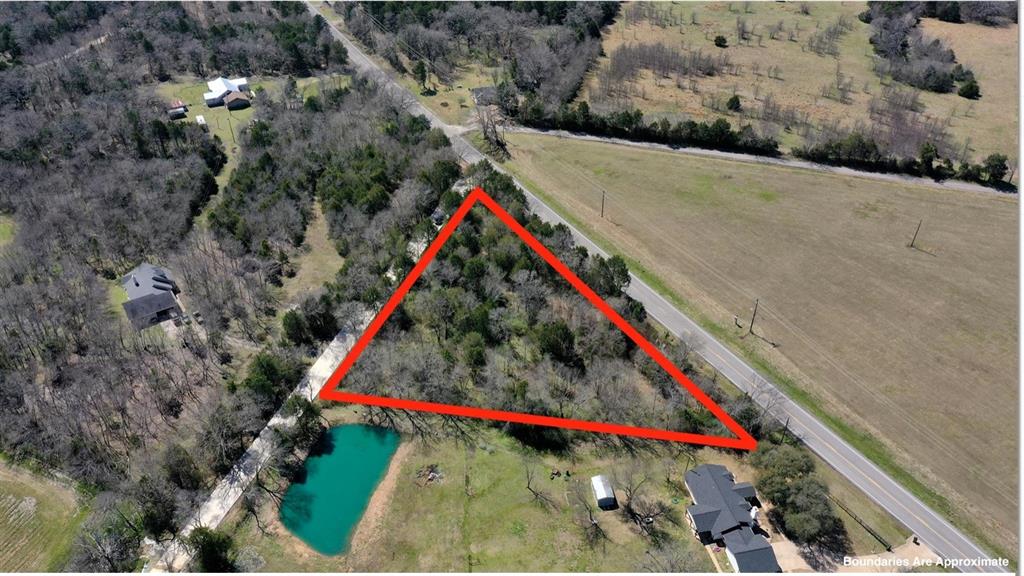 Beautiful wooded 2 acres just north of I-20. Property is outside of the city limits without any known restrictions. Ideal for a future home or commercial site. Amazing opportunity with convenient access to major roadways.