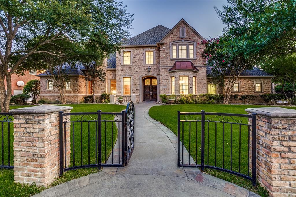 Stunning Preston Hollow traditional on oversized corner lot with an ideal floorpan perfect for family living and entertaining. 1st floor features soaring 20 ft ceilings, open concept living, impressive study & chef's kitchen with professional grade appliances, wine cellar & 2 pantries open to the oversized family rm & breakfast area. Master BR has fireplace, luxury spa bath & views of the backyard pool as does 1st floor guest BR.  3 BR on 2nd floor with ensuite baths along with light-filled game room & massive bonus room perfect for play rm or media rm. Exterior has 3 car garage, electric gate & outdoor living with fireplace, kitchen & grill overlooking spa, pool and waterfall perfect for outdoor enjoyment.
