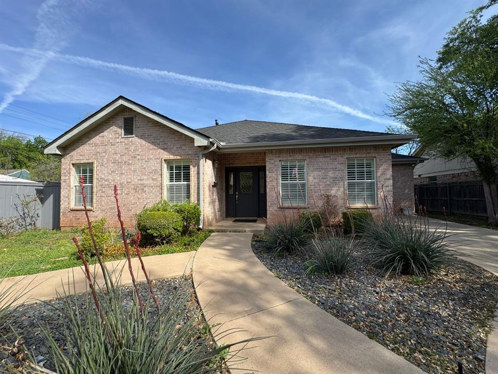 Classy Two-Bedroom, Three-Bath Garden Home in a serene Southside setting. This beautifully designed garden home features a split bedroom layout and offers both formal and casual dining options. Highlights include plantation shutters, a cozy fireplace, and a rear-entry garage. This custom-built home boasts numerous extras, including a spacious kitchen with an island. NEW ROOF SPRING 2026.