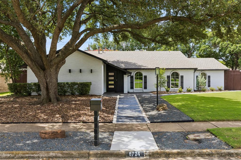 Discover a rare opportunity to own this fully renovated 5-bedroom, 2-bath home where nearly every surface and system has been thoughtfully reimagined with premium materials, meticulous craftsmanship, and modern technology. Stripped to the studs and renovated over 18 months by a dedicated craftsman, this 2,106-square-foot residence offers true turnkey living with exceptional attention to detail. The kitchen features Pro American Woodmark Sage cabinetry, Calacatta Royale quartz countertops, a Ruvati undermount sink, smart GE refrigerator, GE Profile microwave, Frigidaire 5-element range, stainless dishwasher, illuminated pantry, and waterproof rigid-core luxury vinyl flooring. The striking fireplace is wrapped in oversized Baltoro Italiano porcelain tile, while new Pella windows, sheetrock, lighting, ceiling fans, bathrooms with frameless showers, stylish vanities, and designer finishes create a polished contemporary interior. Smart enhancements include a Schlage electronic keypad lock, Amazon-compatible thermostat and garage opener, Ring front and rear cameras, and programmable RGB lighting. Outside, enjoy a stamped patio, illuminated hardtop gazebo, natural gas grill plumbed to the home, butcher block serving bar, premium landscaping, decorative boulders, mature Japanese maple and Blue Cypress, automatic gate, modern exterior cladding, custom mailbox, gas lantern, metal storage shed, and a showroom-quality garage with GarageTrac flooring. A new roof installed in 2023 adds additional peace of mind. Located adjacent to the Kiowa Parkway Nature Trail with convenient access to the Dallas North Tollway, I-635, and US 75, the property is also close to Addison dining, entertainment, Village on the Parkway, the University of Texas at Dallas, Addison Airport, shopping, parks, and everyday conveniences. Luxury finishes, smart-home features, and remarkable craftsmanship make this exceptional property stand out.