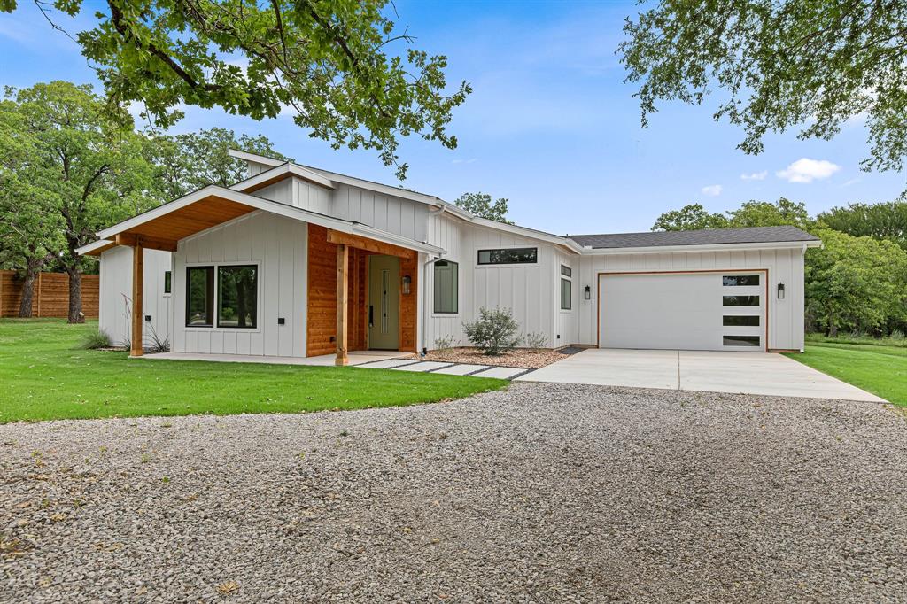 Escape to peaceful country living in this stunning 2025 new construction home tucked away on 1.79 wooded acres in the desirable Paradise community. Surrounded by mature trees and natural beauty, this property offers privacy, space, and modern comfort all in one.
Step inside to a bright, open-concept design highlighted by vaulted ceilings, decorative lighting, and rich natural woodwork that create a warm yet modern atmosphere. The expansive living area flows effortlessly into the dining space and gourmet kitchen, making it perfect for entertaining or gathering with family. The beautifully designed kitchen features a large Quartzite waterfall island, electric cooktop, stainless appliances, and an oversized walk-in pantry, offering both style and functionality for everyday living. The private primary suite provides a relaxing retreat with a spacious ensuite bath and large walk-in closet. Two additional bedrooms plus a dedicated office offer flexible space for guests, hobbies, or working from home.
Step outside and enjoy the serenity of your 1.79-acre wooded homesite, ideal for outdoor living, future shop space, or simply enjoying the quiet Texas countryside. The home also includes a 2-car attached garage, aerobic septic system, city water, and co-op electric. Located in Bridgeport ISD but only 3.7 miles from the highly sought after Paradise ISD, a school district with open enrollment. This home delivers the perfect combination of modern design, privacy, and country charm.