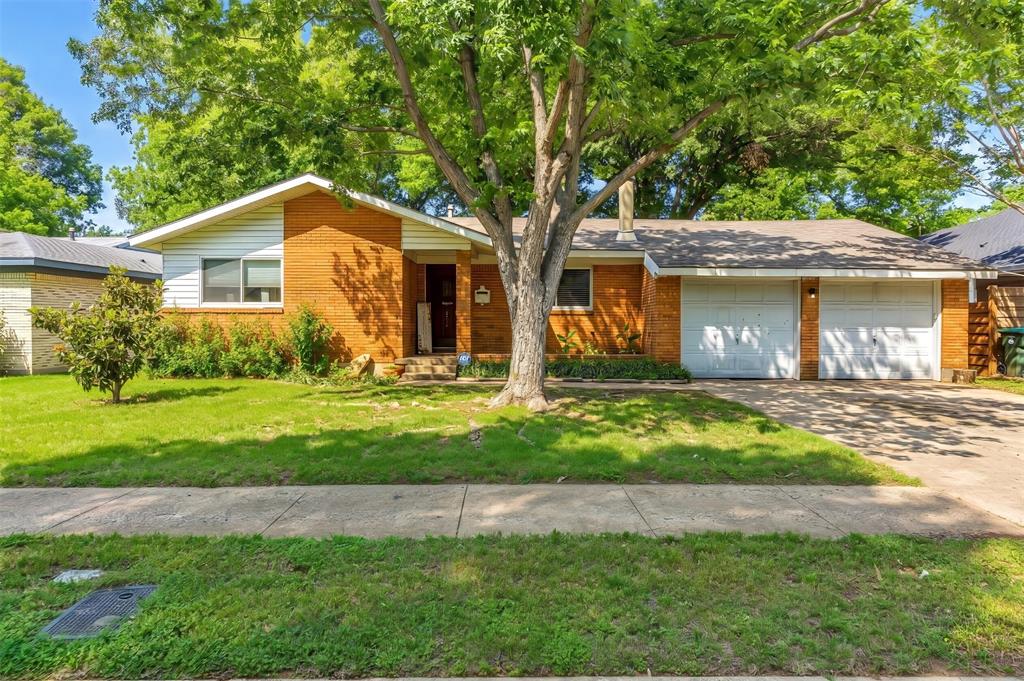 Charming 3-bedroom, 2-bath home in the established Briarwood Estates neighborhood of Arlington. Built in 1957, this single-story residence offers 1,762 square feet of comfortable living space with a functional layout featuring a large living and dining area—perfect for both everyday living and entertaining. A fireplace complete with gas logs makes for cozy evenings in front of the fire. The third bedroom would also make an ideal office or craft room. Natural light fills the interior, creating a warm and welcoming atmosphere throughout. A new roof has been installed in May 2026.
The home features a galley kitchen equipped with an electric range, dishwasher, and custom oak cabinetry, opening into inviting living spaces. The kitchen sink has new plumbing underneath. A large utility room with built in cabinets for storing laundry essentials allows plenty of space for side-by-side Washer and Dryer and adding even more storage space.  
The large primary bath includes a jetted tub great for relaxing after a long day, as well as dual sinks and generous counter space. A built-in dresser and cabinets allow for plenty of storage. Both baths have new faucets as well as under sink plumbing. Two bedrooms have large walk-in closets. 
Situated on a spacious lot, the property offers a generous backyard with a covered patio—ideal for outdoor gatherings or relaxing evenings.  Landscaping adds a touch of beauty to the property with a gorgeous magnolia bush, daffodils and canas and several large trees for shade providing help with cooling bills. Located within Arlington ISD and conveniently positioned near UTA, local schools, shopping, dining, the Arlington entertainment district and major roadways, this home combines classic charm with everyday convenience.
A great opportunity to own in a well-established neighborhood—schedule your showing today!