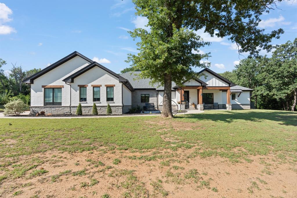 This is a beautiful property with everything you will ever need. This 4 bedroom-3.5 bath home includes a dedicated office (could be used as 5th bedroom), a large walk-in pantry with a spot for an upright freezer, and a large walk in laundry room with space for a drink refrigerator.  There is a separate drink station right off of the kitchen.  There is also a separate living area which can be used as an entertainment room or man cave.  The house has a 3-car garage and also has a cement pad in back yard ready for you to add your hot tub. 

The barn is 1600 sq feet with a cement pad. It includes a RV pad behind it complete with electricity and water hookups.

The lot is 2.76 acres of trees and a beautiful pond. This dream property is just minutes from great schools and some of the best shopping opportunities in Burleson (HEB, Target, Home Depot, Kroger, and Sprouts just to name a few).