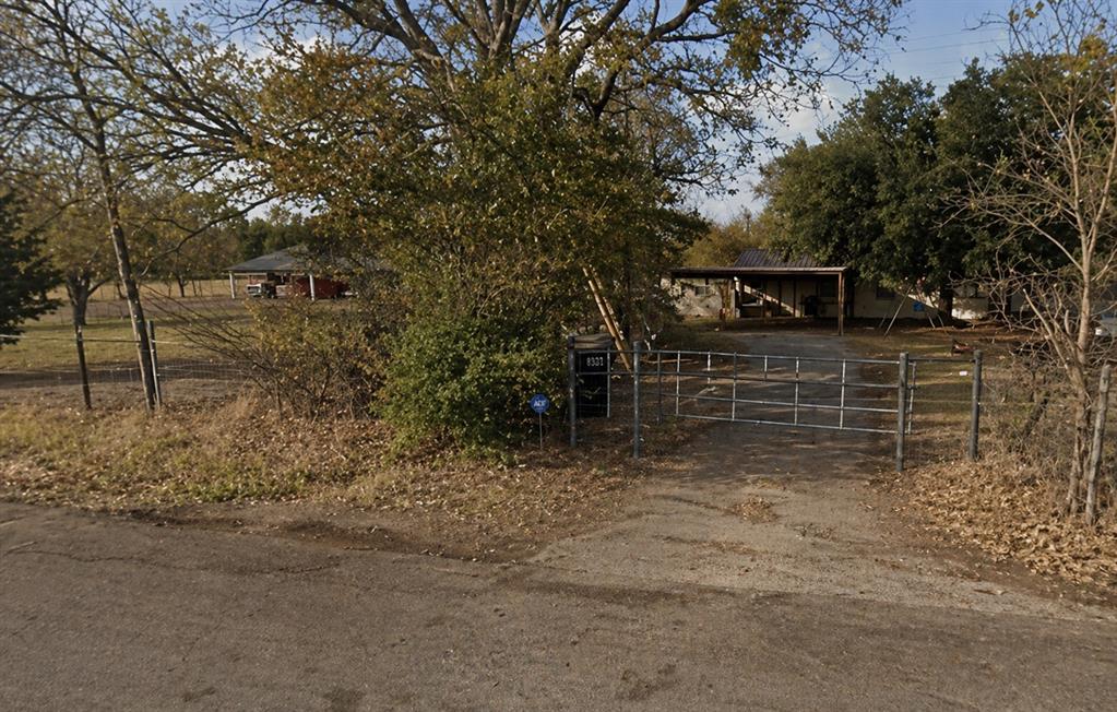 This unique property includes two adjoining parcels being sold together—Tract 54 (3.457 acres) and Tract 53 (0.733 acres) totaling approximately 4.19 acres. Enjoy peaceful country living with convenient access to downtown Caddo Mills, Greenville, and I-30. The property features mature trees, open views, and ample space for outdoor entertaining, livestock, or future additions such as a shop or guest house. An on-site sewer system provides added convenience and functionality for acreage living. The main residence offers approximately 2,058 square feet with five bedrooms, three bathrooms, a spacious family room, dining area, kitchen plus kitchenette, mud room, utility room, and a four-car carport. A second dwelling provides approximately 1,743 square feet of living space with an attached workshop, including a kitchen, family room, two bedrooms, one bathroom, and a utility laundry room ideal for multi-generational living or potential rental income. Outdoor amenities include a covered back deck, open patio, workshop, barn, quonset hut, and an additional two-car carport. Refrigerator, freezer, and two boxcars convey with the sale. Offering flexibility, functionality, and the charm of acreage living, this property presents endless opportunities while remaining close to nearby amenities.