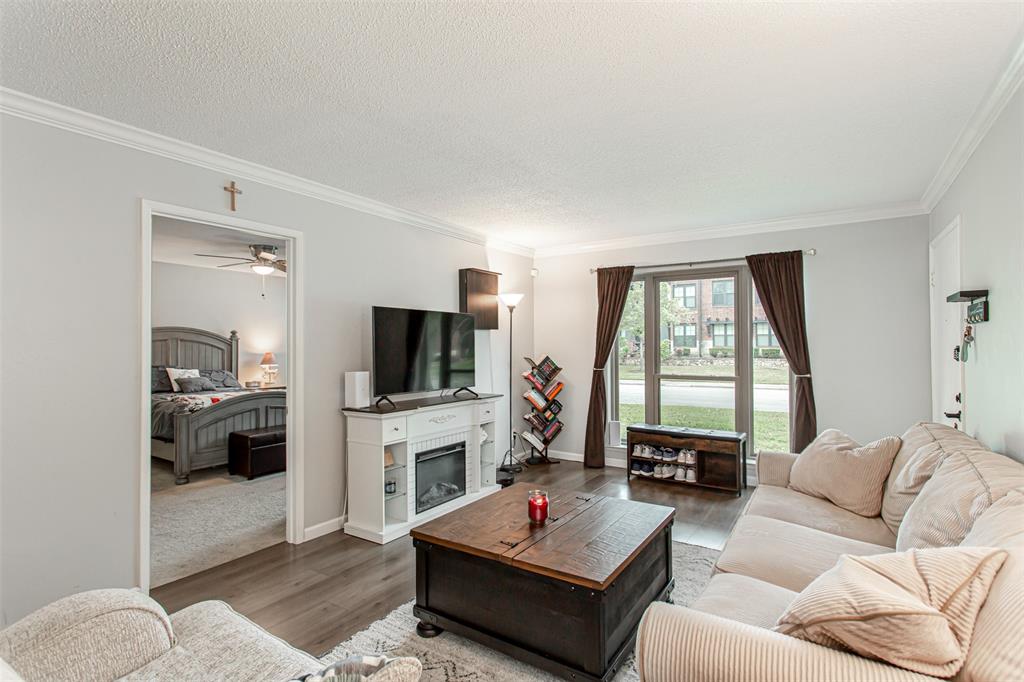 Beautifully updated 2-bedroom, 2-bath condo offering 1,290 square feet of well-designed living space. The spacious living and dining areas feature wood-look flooring, neutral tones, and a functional open layout. In addition to the main living area, the home includes a second living room, ideal for a media room, home office, or flexible bonus space.
The updated kitchen boasts white cabinetry, quartz-style countertops, subway tile backsplash, stainless steel appliances, and modern fixtures. Both bedrooms are generously sized with ceiling fans and ample closet space. Each bedroom offers access to an updated en-suite bath, with the primary suite featuring a private bath and separate vanity area. Both bathrooms have been updated with contemporary finishes.
Additional features include a covered patio, in-unit washer and dryer, and one reserved covered parking space. Community amenities include a pool and beautifully maintained grounds. Ideally located just minutes from Greenville Avenue, shopping, dining, and nightlife, with easy access to Central Expressway (US-75) for convenient commuting.