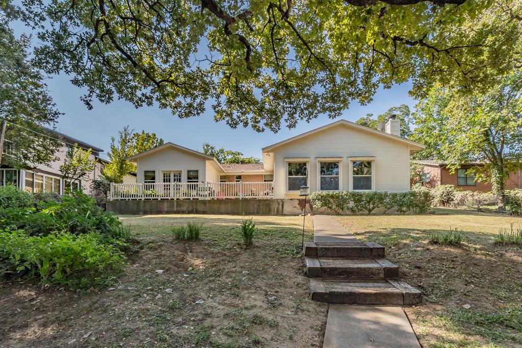 Lake Living at Its Best!

Only 20 minutes from downtown Fort Worth, this stunning 3-bedroom, 2-bath lakefront home sits on over a third of an acre in peaceful Stoners Cove on Eagle Mountain Lake. Enjoy your private dock with boat lift plus neighborhood boat ramp access.

Completely rebuilt from the studs out by a master trim carpenter, this home features updated electrical, plumbing, HVAC, and insulation, along with hardwood floors, redwood cabinetry, and custom built-ins throughout.

Relax by one of two fireplaces, including a double-sided fireplace between the primary bedroom sitting area and primary bath, perfect for unwinding in the jetted tub. The property also includes a two-car garage, shaded patio with lake views, and a 12x12 lofted storage building with electricity. The boat dock has a lift and has been updated decking and steel post. 

The House has been covered by a home warranty for several years and it is current. Just recently the dishwasher was replaced by the home warranty.
This home warranty will be extended to the new owner up to one year. 

Perfect for full-time living, a vacation home or a short-term rental investment(allowable in the Azle area), this one-of-a-kind home blends lake-life tranquility with top-tier craftsmanship. 

Listing agent offering boat tours of the cove.

Come see it for yourself.
