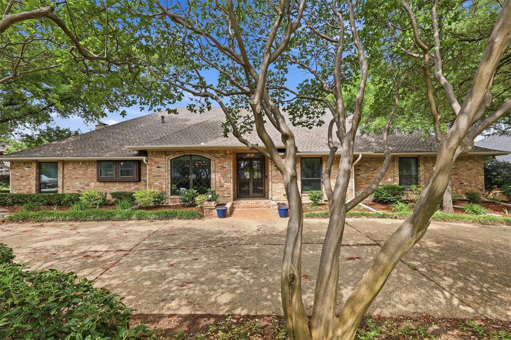 Exceptional 4-bedroom, 3 full bath, 2 half bath residence offering 3,983 sq. ft. of thoughtfully designed living with no HOA. This home is an entertainer’s dream, featuring expansive living spaces including a grand family room with a fully equipped bar and fireplace, along with a secondary living area accented by its own fireplace. The private primary retreat boasts dual walk-in closets and French doors that open to an impressive outdoor living space. The oversized patio is designed for elevated entertaining, complete with extensive space, exterior storage, and a convenient half bath. Lush landscaping with mature trees and curated flowerbeds enhances the setting. Significant upgrades include cast iron plumbing replaced in 2021, a new roof in 2024, and a professionally repaired foundation by Brown Foundation Repair with a lifetime transferable warranty (confirmed stable in 2025). the electrical is updated, upgraded and all up to code. Ideally positioned near Firewheel Town Center and major thoroughfares including PGBT (190), I-30, and 635.