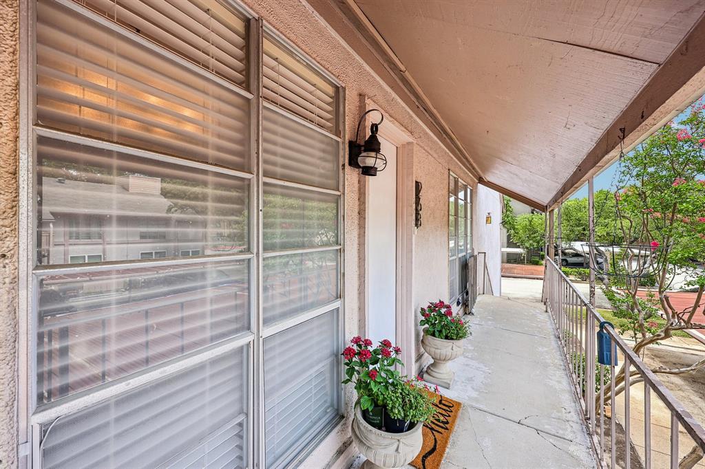 Welcome to this spacious 2-bedroom, 2.5-bath condominium offering 1,663 square feet of comfortable living in the gated Hollows North community, ideally located in the heart of North Dallas. Thoughtfully designed with an open floor plan, this home features expansive living, dining, and flex space that can easily serve as a home office, reading nook, or additional entertaining area. Large windows fill the home with natural light, while the spacious layout provides endless possibilities for today's lifestyle.

Both bedrooms are generously sized, with the oversized primary suite offering private access to the covered patio, creating the perfect spot to enjoy your morning coffee or unwind in the evening. Additional highlights include a wood-burning fireplace, abundant storage, and two assigned covered carport spaces located just steps from the unit.

Residents enjoy the security of a gated community with beautifully maintained grounds and a community pool. The HOA provides exceptional value by covering all utilities, including electricity, water, sewer, trash, basic cable, HVAC maintenance, exterior building maintenance, landscaping, and common area upkeep, making for truly low-maintenance living.

Conveniently situated near Preston Hollow, NorthPark Center, Medical City, Presbyterian Hospital, and with quick access to US-75 and I-635, this condo offers the perfect combination of space, convenience, and lock-and-leave living in one of North Dallas' most desirable locations.