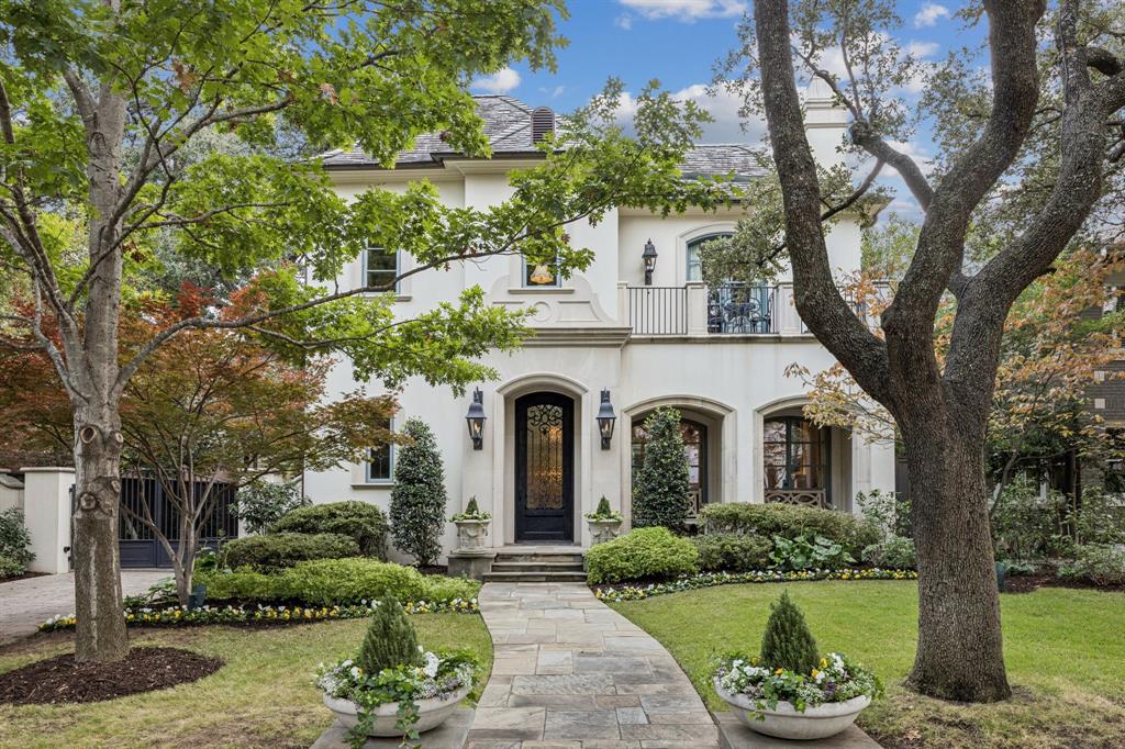 3317 Princeton Avenue is a rare, turnkey Highland Park offering in one of the Park Cities’ most coveted locations, just minutes from Highland Park Village, Snider Plaza, SMU, and the Knox District, with convenient Katy Trail access and close proximity to top restaurants, and premier shopping. This home delivers the lifestyle buyers want: walkable amenities, privacy, and a floor plan designed for both everyday living and entertaining as well as Highland Park Schools.
Soft French-inspired architecture, abundant natural light, and a seamless indoor-outdoor flow define the home. Ten sets of French doors line the main living areas, opening to inviting outdoor spaces and filling the interiors with beautiful light. Designer finishes elevate every room with Venetian plaster, art lighting, exceptional stone and quartzite selections, custom millwork, and a level of polish that feels truly bespoke.
A major differentiator for this location, the oversized lot accommodates a drive-through porte-cochère and a 3-car attached garage rare functionality and arrival that most Highland Park homes simply cannot offer. Additional highlights include elevator access, Control4 home automation, two staircases, multiple gathering spaces. The expanded primary suite is a private retreat featuring custom his-and-her closets and a balcony overlooking the pool. Outdoors, enjoy a beautiful pool and spa plus a covered patio designed for year-round comfort with screens, heaters, fans, and a fireplace creating an outdoor living space you can truly use in every season. For those seeking an elevated Highland Park lifestyle in an unbeatable location, this is one to experience in person.