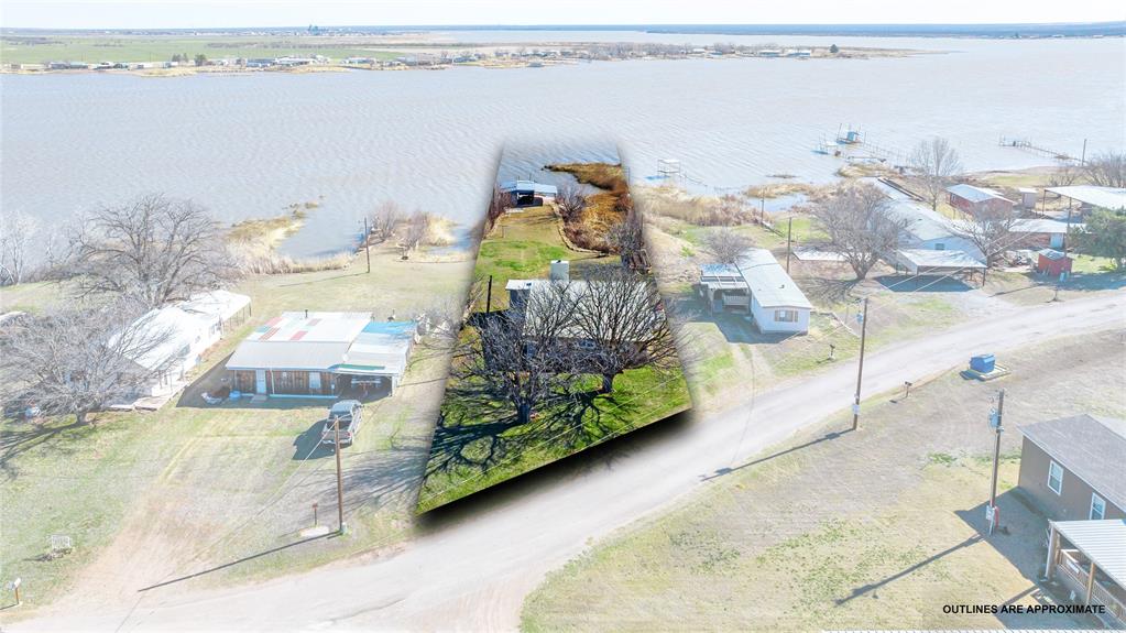 Sitting right on the waterfront of Lake Stamford, this fantastic 3bed, 1bath lake home offers the perfect blend of comfort and recreation. The home features a welcoming living area and a built-on sun porch ideal for relaxing with lake views. Enjoy all the lake amenities—boating, fishing, swimming, and endless outdoor fun. Recent updates include a newer roof and a remodeled bathroom. A private dock sits just steps from the home and, while it needs a little attention, it provides excellent potential for lakeside enjoyment. A wonderful opportunity to own a true lakefront getaway.