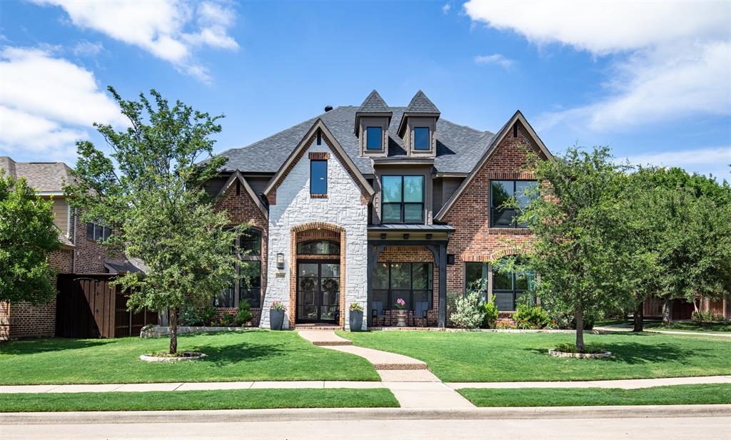 Set on a coveted corner lot beside a greenbelt, this beautifully reimagined luxury home blends timeless elegance with today’s most desired upgrades. From the moment you arrive, the striking black iron double front doors, lush landscaping, & covered front porch create unforgettable curb appeal. Inside, rich white oak hardwood floors, crown molding, decorative art niches, and custom built-ins set the tone for sophisticated living. The heart of the home is a stunning chef’s kitchen featuring quartz & marble counters, a large island, KitchenAid Architect Series appliances, double ovens, gas cooktop, brushed gold accents, updated backsplash, designer lighting, oversized walk-in pantry, & seamless flow into the inviting family room anchored by a dramatic floor-to-ceiling black limestone fireplace. Designed for both entertaining & everyday comfort, the home offers a media room with projector, screen & surround sound, a stylish upstairs wet bar & an extraordinary custom wine room with insulated glass walls, limestone tile, floating wine racks & Breezaire cooling system. Electric shades in the family room automate with sunrise and sunset for effortless luxury. The primary retreat is a true sanctuary with a double-sided fireplace shared with the office, spa-inspired bath with jetted tub, frameless shower, custom marble finishes, and dual expanded custom closets. Upstairs baths are equally refined with upgraded granite, marble tile. Every detail has been thoughtfully updated, including renovated laundry & mudroom spaces with built-in lockers, mom office, custom pocket door, and a new added half bath. Major improvements include Trane HVAC systems, roof, windows, foundation repair with warranty, updated ductwork for balanced airflow, EV charger, turf backyard, epoxy garage floors & board-on-board privacy fence. Luxury, comfort & exceptional craftsmanship come together in a home designed to impress at every turn. Search address in YouTube for video.