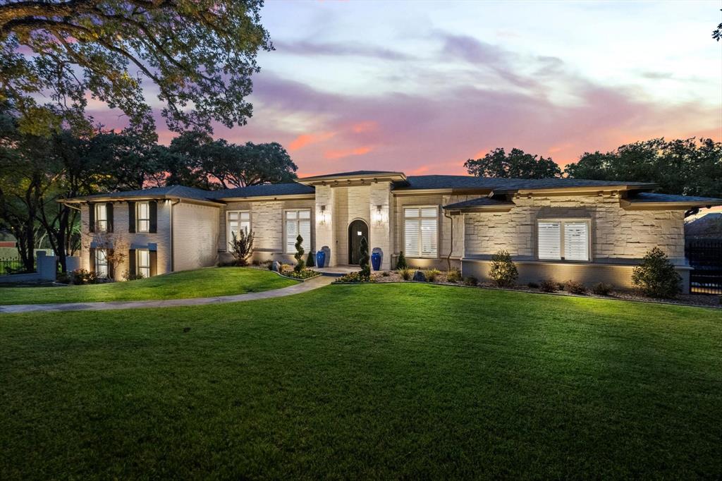 MULTIPLE OFFERS RECEIVED, highest & best due Sat, 7.20. Nestled moments from the lake, this estate was meticulously reconstructed in 2023. The split-level design offers grandeur reminiscent of a single-story haven. The heart of this home is a sunlit kitchen with a new Thermador range, dual dishwashers, a Miele refrigerator, & a spacious walk-in pantry—a culinary enthusiast's dream. The private wing primary suite boasts a secluded patio, coffee bar, & two versatile bonus rooms. The upper level features 3 generously sized bdrms & 2 baths. The lower level is ideal for in-laws, with a living-dining area, kitchenette, 2 bdrms, full bath, & private patio. The resort-style yard includes a remodeled pool with pebbletec surface, new decorative tile and coping, resurfaced lighted tennis and pickleball court, outdoor kitchen, & 4 patios surrounded by mature gardens. This property seamlessly blends elegance & functionality, creating an ideal retreat for luxurious living & entertaining.